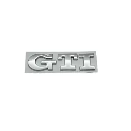 Емблема напис GTI для Volkswagen срібляста 79х23 мм метал (на скотчі)