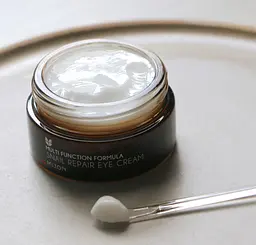 Крем для області навколо очей Mizon Snail Repair 25 мл - мініатюра 3