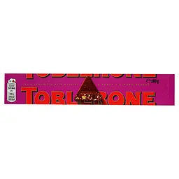 Шоколад молочний Toblerone з родзинками та нугою з меду та мигдалю 100 г (479986)