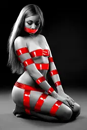 Скотч для бондажу Fetish Tentation 15м червоний - мініатюра 5