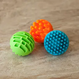 Прорізувач-брязкальце Fat Brain Toys Sensory Rollers Сенсорні кулі 3 шт. (F161ML) - мініатюра 4