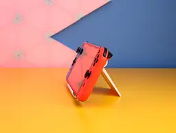 Портативна ігрова консоль Nintendo Switch OLED з неоново-синіми та неоново-червоними Joy-Con (045496453442) б/в [174778] - мініатюра 2