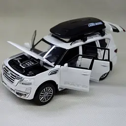 Колекційна металева модель автомобіля АвтоЕксперт Nissan Patrol з багажником на даху, інерцією, світлом та звуком 1:32 - мініатюра 8