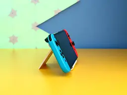 Портативна ігрова консоль Nintendo Switch OLED з неоново-синіми та неоново-червоними Joy-Con (045496453442) б/в [174778] - мініатюра 3