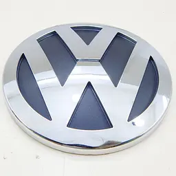 Емблема кришки багажника Volkswagen Caddy/T5 130 мм (на скотчі) 7HO853630