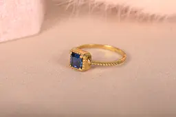 Каблучка з жовтого золота з синім фіанітами 21 K-0218