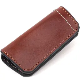 Зручна шкіряна ключниця Grande Pelle 11392 коричневий