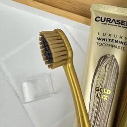 Набір Curasept Gold Whitining Luxury (паста 75 мл + зубна щітка) - мініатюра 2