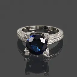 Каблучка з родієвого срібла з корундом та фіанітами 16.5 SK-0067