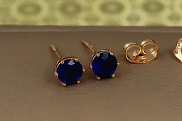 Сережки гвоздики Xuping Jewelry синій фіаніт на шість кріплень 6 мм золотисті