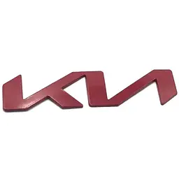 Емблема напис Kia NEW Червона 210x49 мм металева на скотчі (заводська)