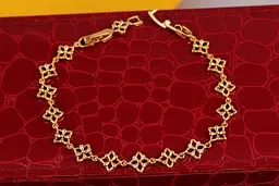Браслет Xuping Jewelry квадрати з чотирма пелюстками в середині 19,5 см 7 мм золотистий