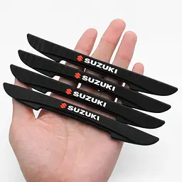 Захисні протиударні смуги Suzuki 15х147 мм Гума (наклейки) Чорні 4 шт на скотчі (Завод) - мініатюра 2