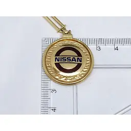 Золотий брелок NISSAN. 5221550 - мініатюра 5