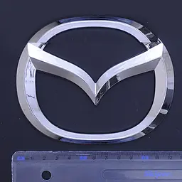 Емблема для Mazda 3 125 x 100 мм 3М скотч - мініатюра 2