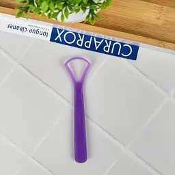 Скребок для язика Curaprox одна дуга (фіолетовий)