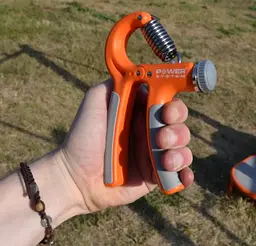 Еспандер кистьовий Power System PS-4021 з регульованим навантаженням 10-40 кг Power Hand Grip Orange (PS-4021_Orange) - мініатюра 7