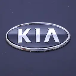 Емблема для Kia 115 x 60 мм 3М 3M скотч