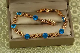 Браслет Xuping Jewelry Фуете з блакитними каменями 19 см 6 мм золотистий