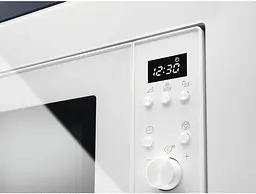Мікрохвильова піч Electrolux вбудована 17л електронне керування 700Вт дисплей білий - мініатюра 2