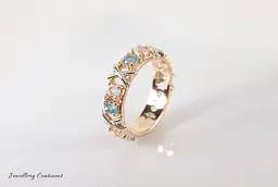 Каблучка з червоного та білого золота з топазами 19 K-0016