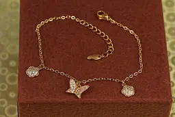 Браслет Xuping Jewelry з підвісками метелик з квіточками 17 см подовжувач 3 см золотистий