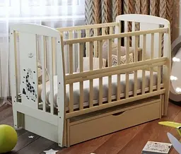 Ліжечко для новонароджених з механізмом заколисування, відкидним бортиком та ящиком "Жирафік" BabyRoom Слонова кістка