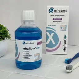 Ополіскувач для ротової порожнини Miradent Mirafluor з CHX 0,06% 500 мл - мініатюра 3