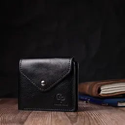Гаманець унісекс з монетницею із глянсової натуральної шкіри GRANDE PELLE 16806 чорний - мініатюра 10