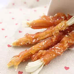 Ласощі для собак Селянські Смаколики скибочки тріски з куркою та кунжутом 12 см 500 г