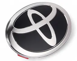 Емблема під склом Toyota Чорна 110х75 мм на скотчі (Завод)