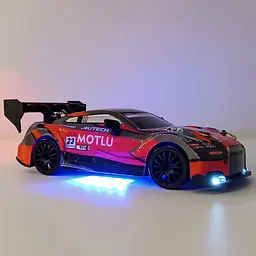Машинка для дріфту Nissan GT-R 20 км/год. Повний привід. Додаткові колеса. Фари - мініатюра 15