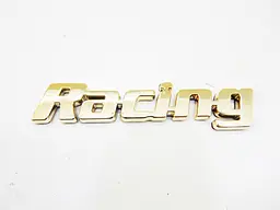 Емблема напис Racing (Золото) 107х20мм (на скотчі)