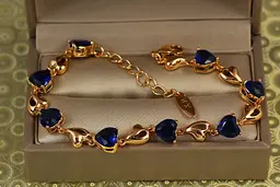 Браслет Xuping Jewelry сердечки із синіми каменями на доріжці 17 см 7 мм золотистий