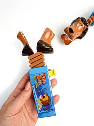 Іграшка з льодяником Lion Bite with lollipop - блакитна малина 17g