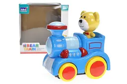 Іграшковий паровозик з ведмедиком зі звуковими та світловими ефектами Bear Train QS144 в коробці р.15х14, 6х9, 5см