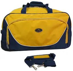 Дорожня сумка на колесах 57L Wallaby 10428-7 синя з жовтим