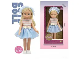 Колекційна лялька A Baby Beauty в блакитному фатиновому платті з чепчиком (WX258-4)