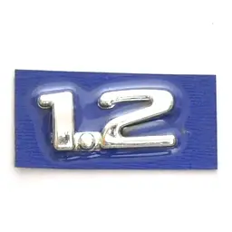 Емблема напис 1.2 Скотч Corsa 40 x 18 мм 1996-2004 (5680)