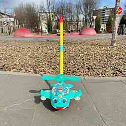 Іграшка дитяча каталка гвинтокрил з ручкою, зі звуком двзіночка, рухливі елементи, підсвічування бірюзовий - мініатюра 6