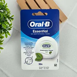 Зубна нитка Oral-B Essential Floss Mint вощена м’ятна для очищення міжзубних проміжків 50 м