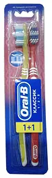 Зубна щітка Oral-B 3-Effect Classic, середня, жовтий з червоним, 2 шт.