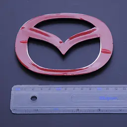 Емблема для Mazda 3 125 x 100 мм 3М скотч