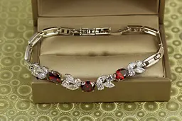 Браслет Xuping Jewelry Зіркопад з червоними каменями 17,5 см сріблястий