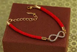Браслет Xuping Jewelry червона нитка з нескінченністю 17,5 см 4,5 мм золотистий