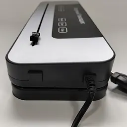 Вакууматор для продуктів Vacuum Sealer з LED-дисплеєм, вбудованим різаком та 10 пакетами для вакуумного пакування - мініатюра 6