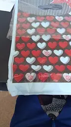 Пакети з вирубаною ручкою (20*30) "Сердечка" жовтий із чорним малюнком (100 шт.) - мініатюра 4