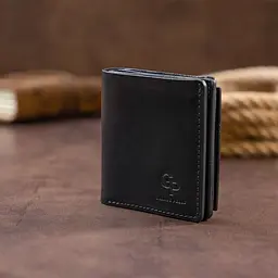 Вертикальне глянсове портмоне з накладною монетницею Grande Pelle 11329 чорне - мініатюра 9