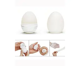 Чоловічий мастурбатор Tenga EGG Wavy яйце + лубрикант та мішечок - мініатюра 7
