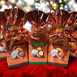 Шоколадні цукерки з фундуком Lindt Weihnachts Nusse Haselnuss 100г - мініатюра 4